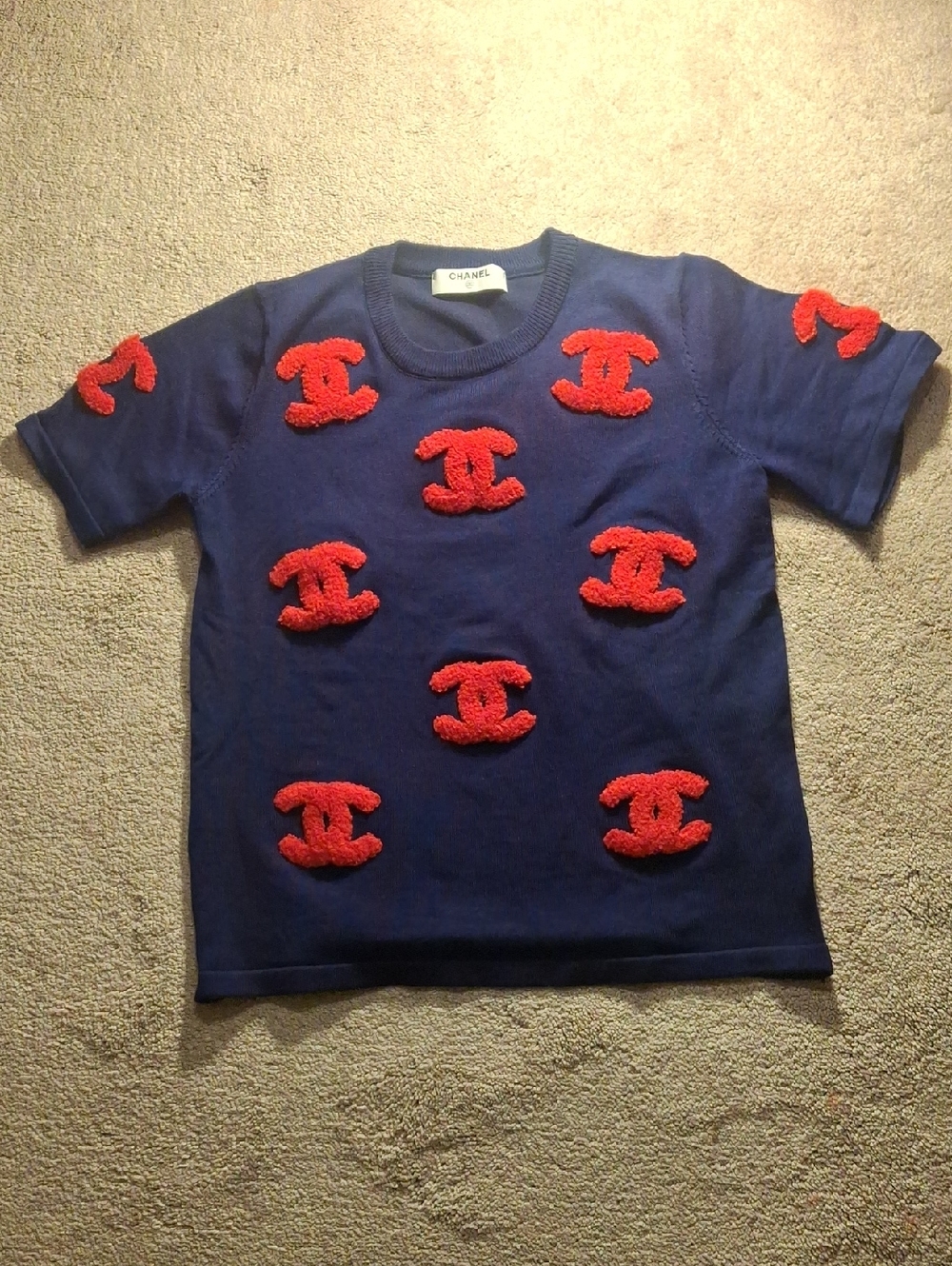 CHANEL Navy Blue Short Sleeve Sweater with Red Embroidered Logo